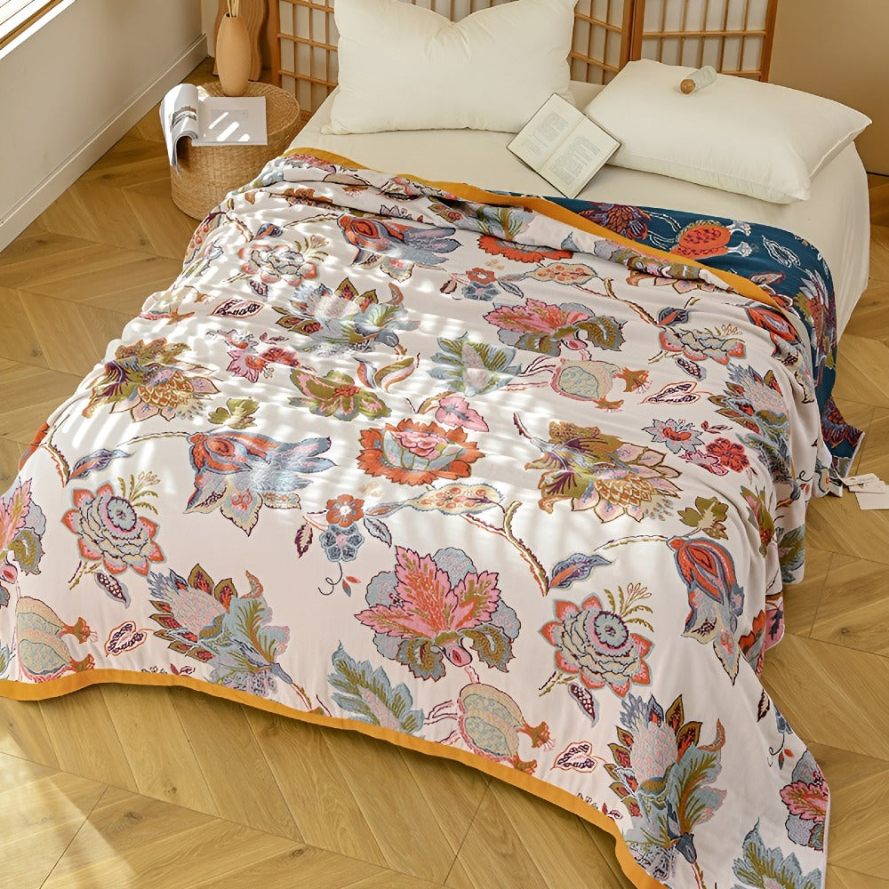 Wildbloom vendbart bomullspledd med blomster