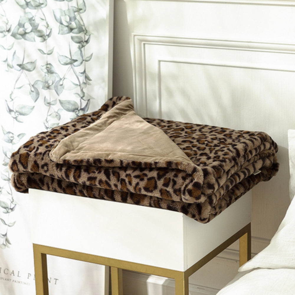 Pledd med leopardmønster