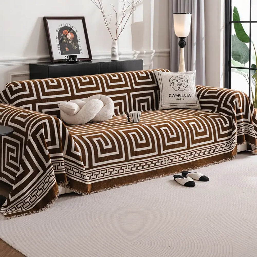 Chenille-sofatrekk med meandermønster og dusker – 71"x51"