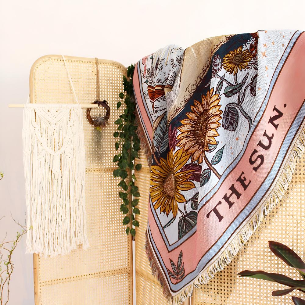 Boho-veggpledd med solmotiv
