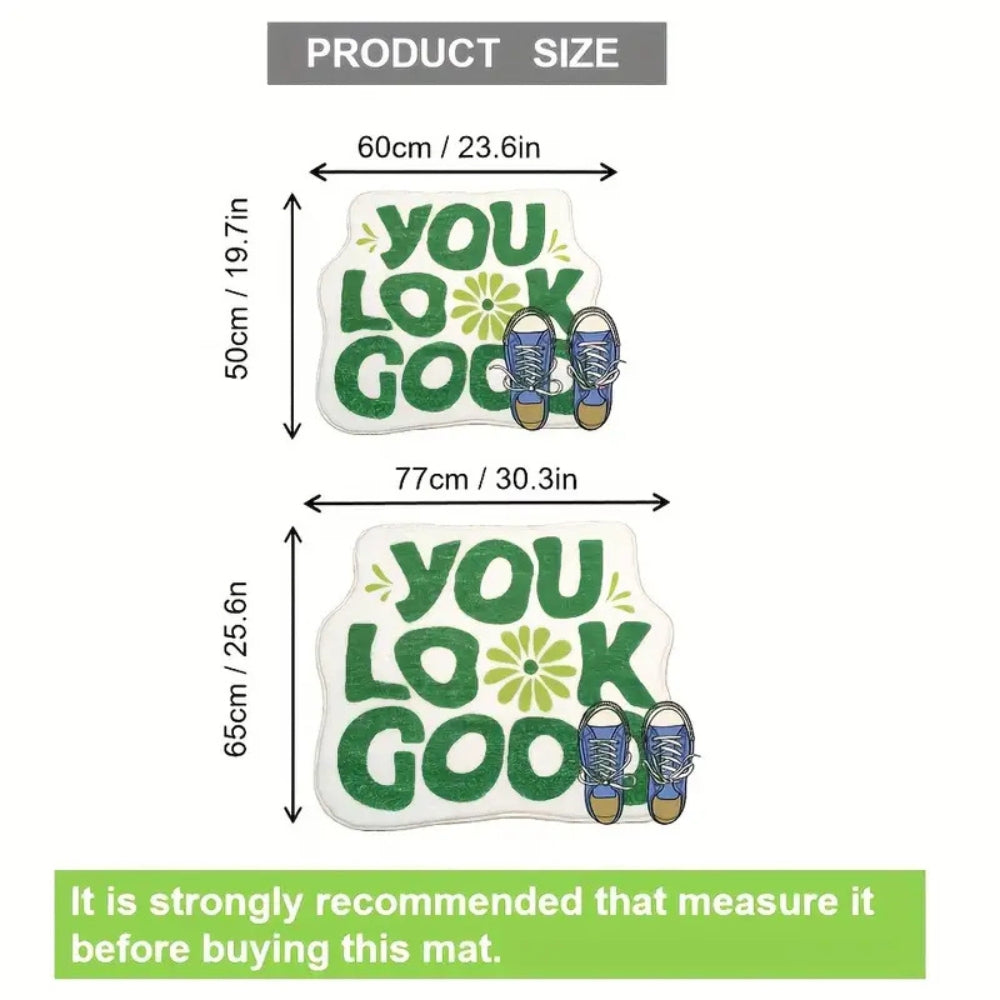 Badematte med teksten «You Look Good»