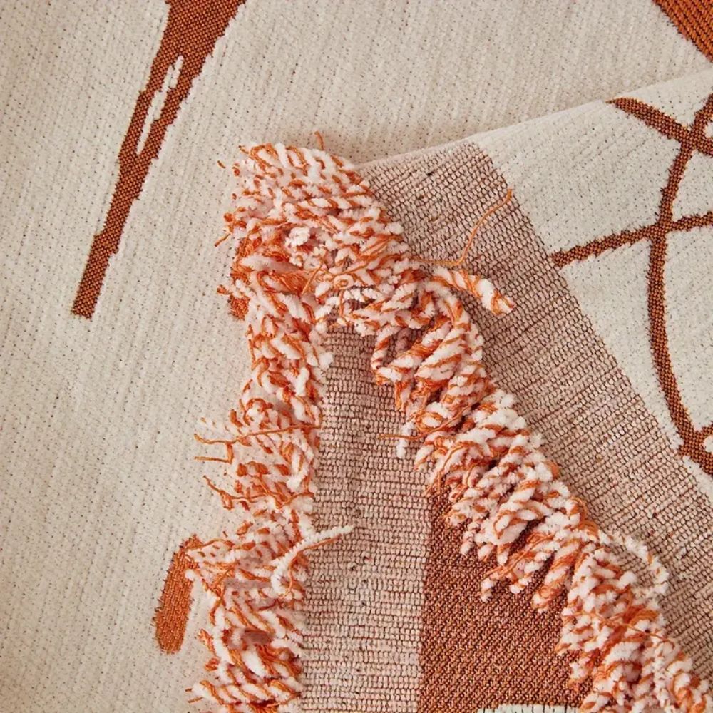 Chenille-sofatrekk med blomsteressens