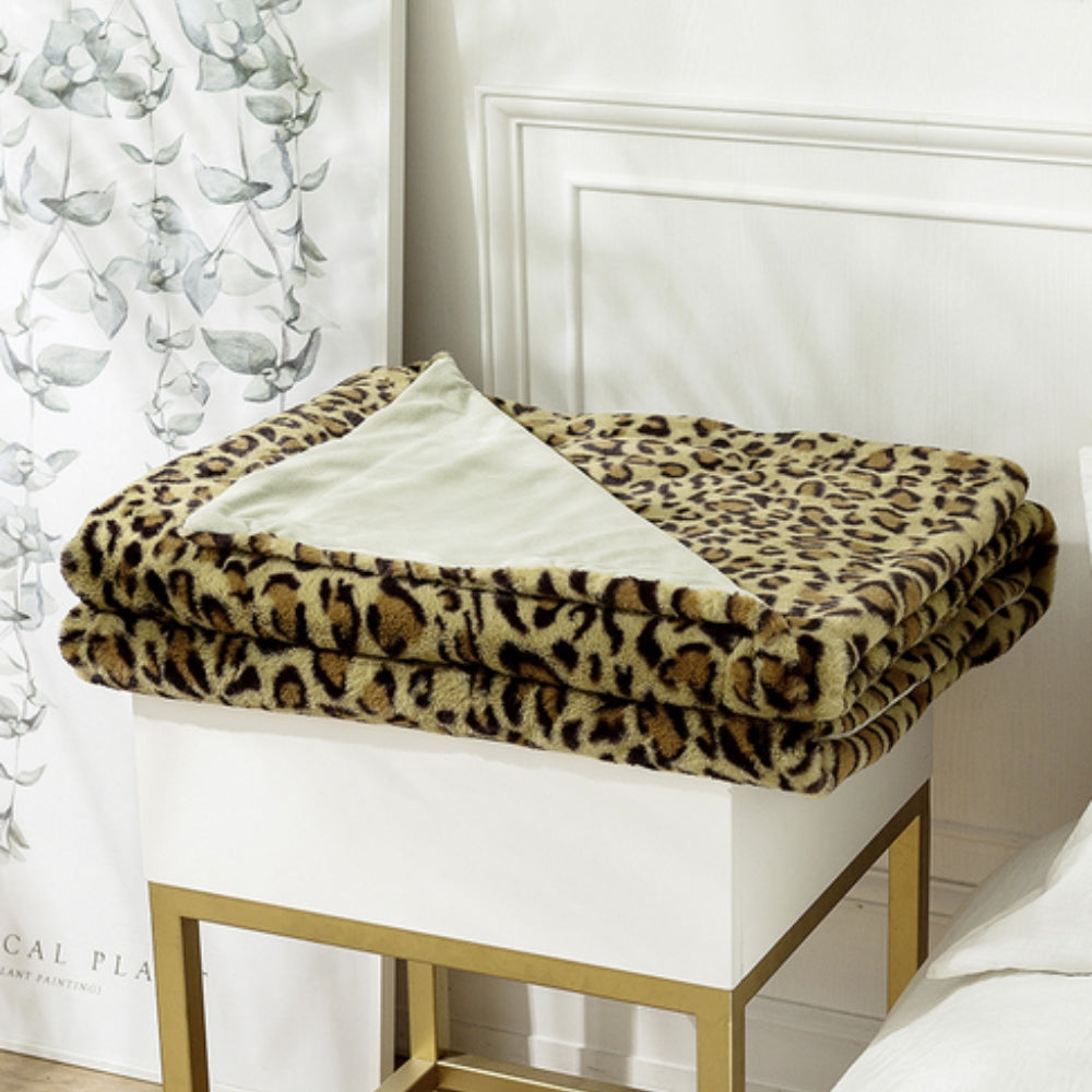 Pledd med leopardmønster