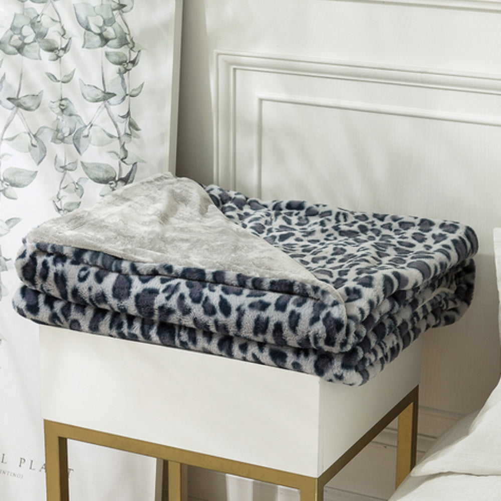 Pledd med leopardmønster