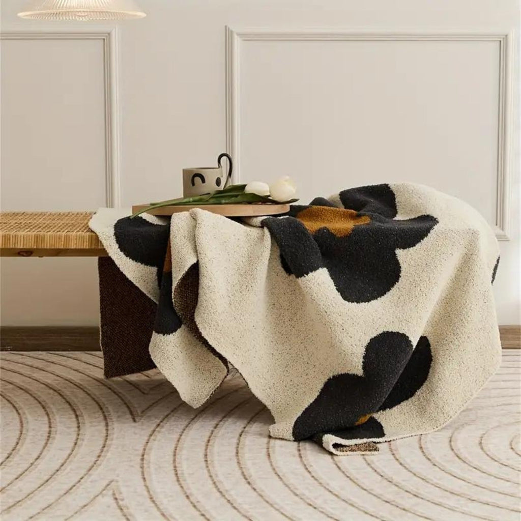 Aurora Bloom | Strikket pledd med blomster