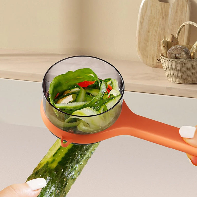 Vegetableskreller med oppbevaringsboks