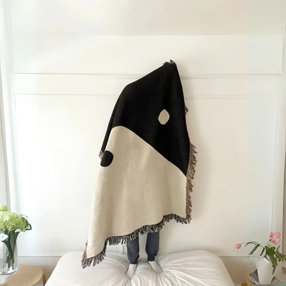 Kunstnerisk veggpledd med yin og yang