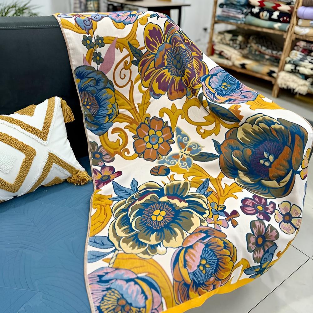Vendbart badehåndkle med blomstrende blomster