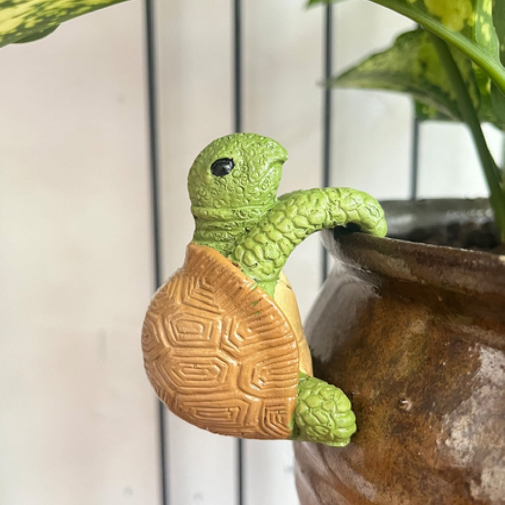 Arden hengende skilpaddefigur i resin