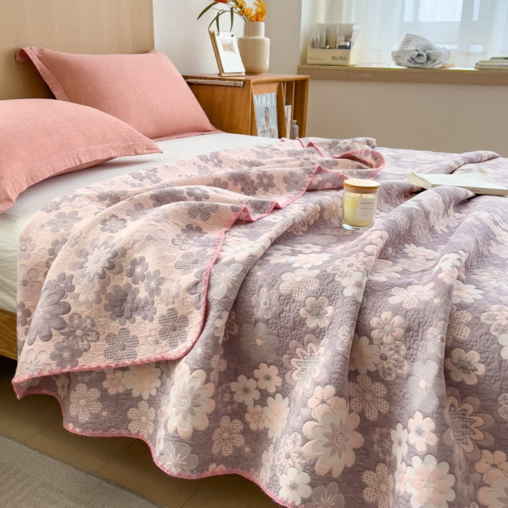 Reverie bomullsgaspledd med blomster
