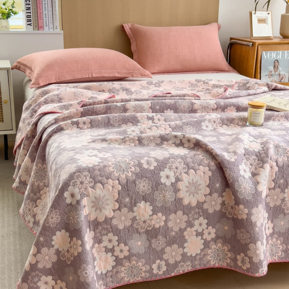 Reverie bomullsgaspledd med blomster