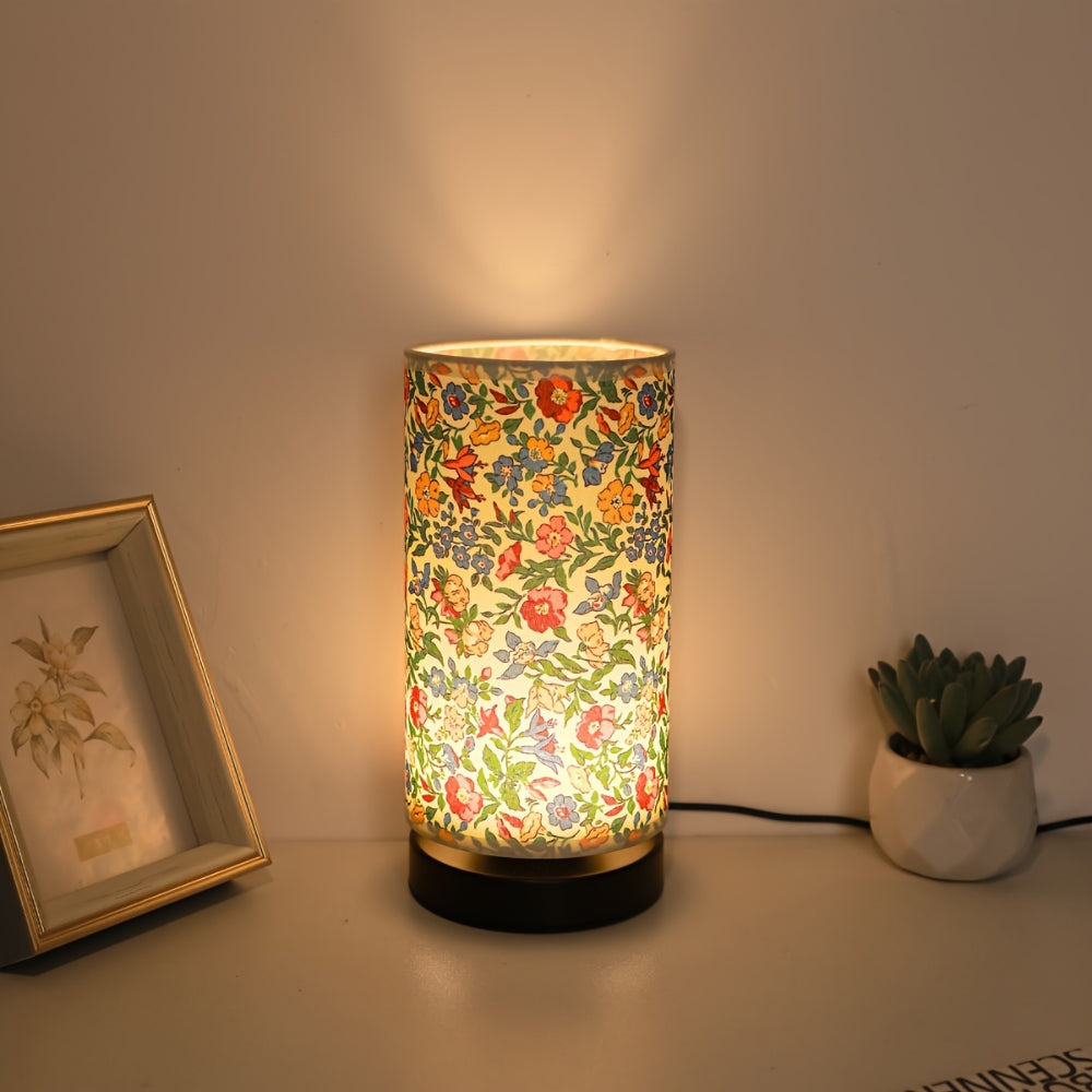 Bordlampe med botanisk blomsterstoff