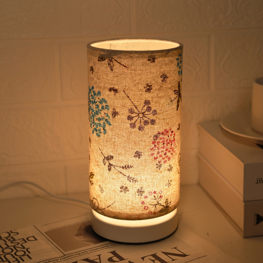 Bordlampe med botanisk blomsterstoff
