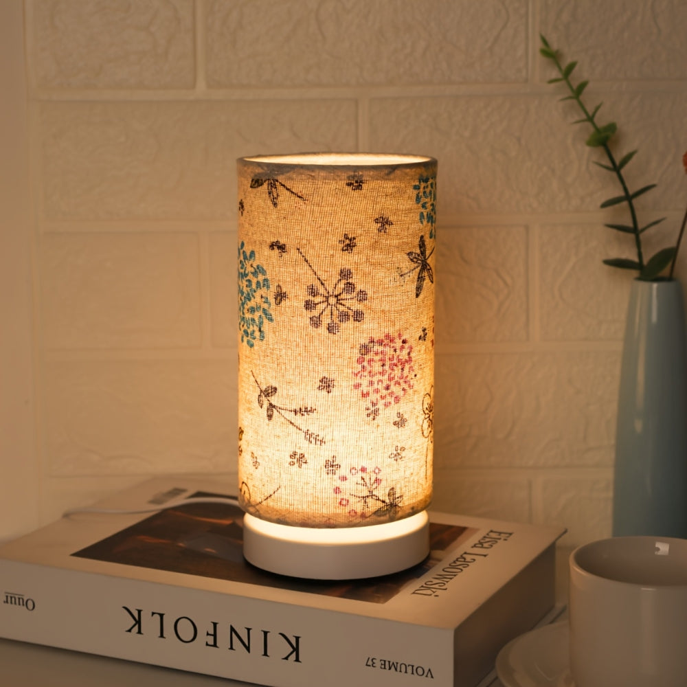 Bordlampe med botanisk blomsterstoff