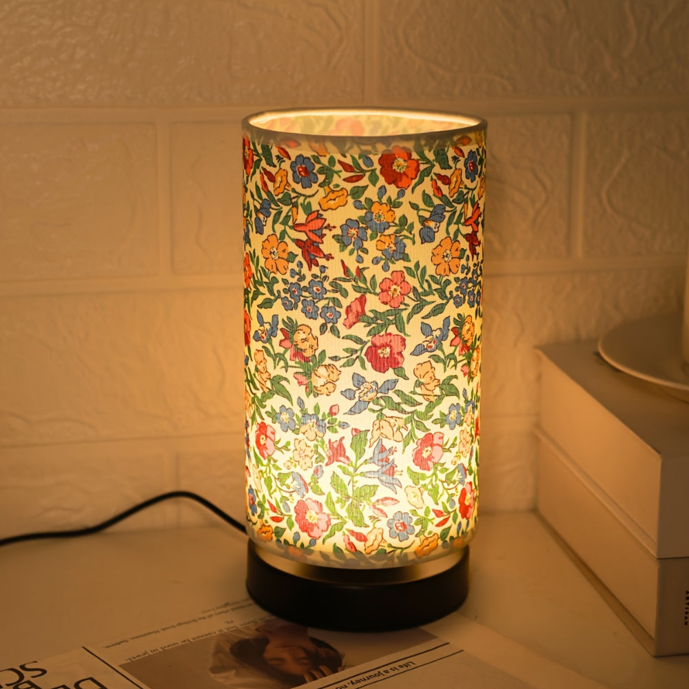 Bordlampe med botanisk blomsterstoff