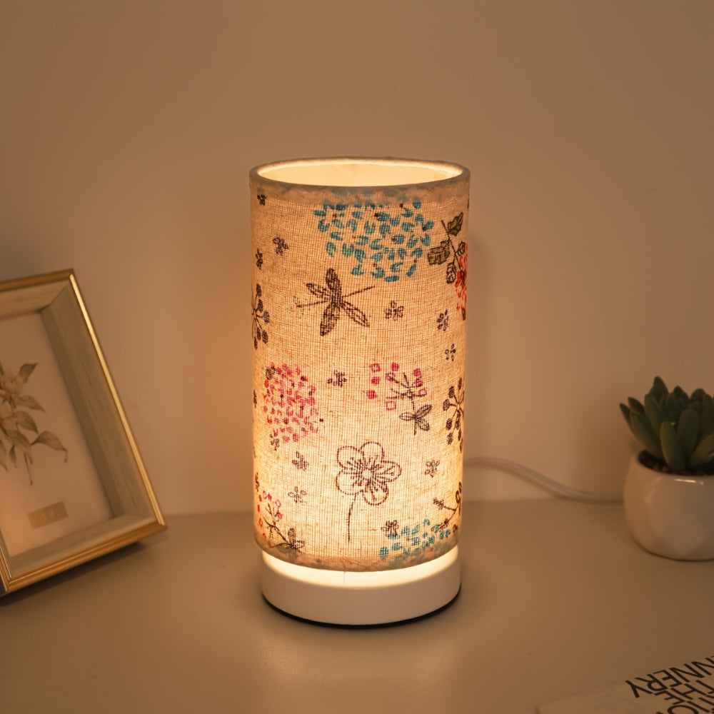 Bordlampe med botanisk blomsterstoff