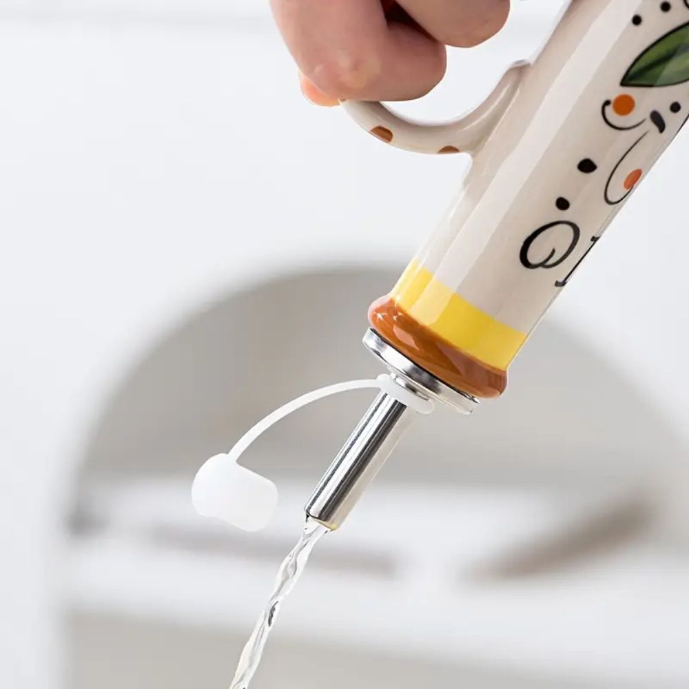 Ceramico oljedispenser i keramikk