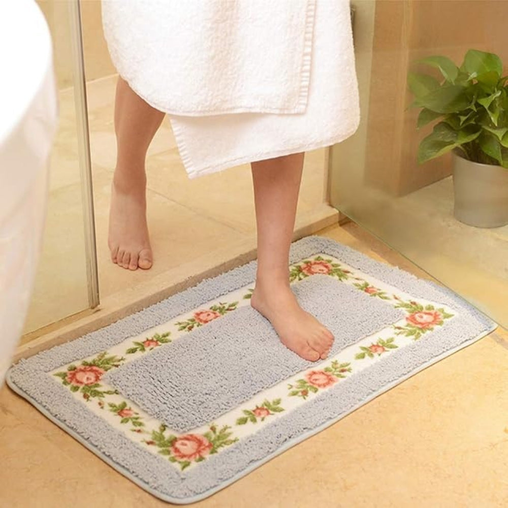 Absorberende badematte med blomsterbord
