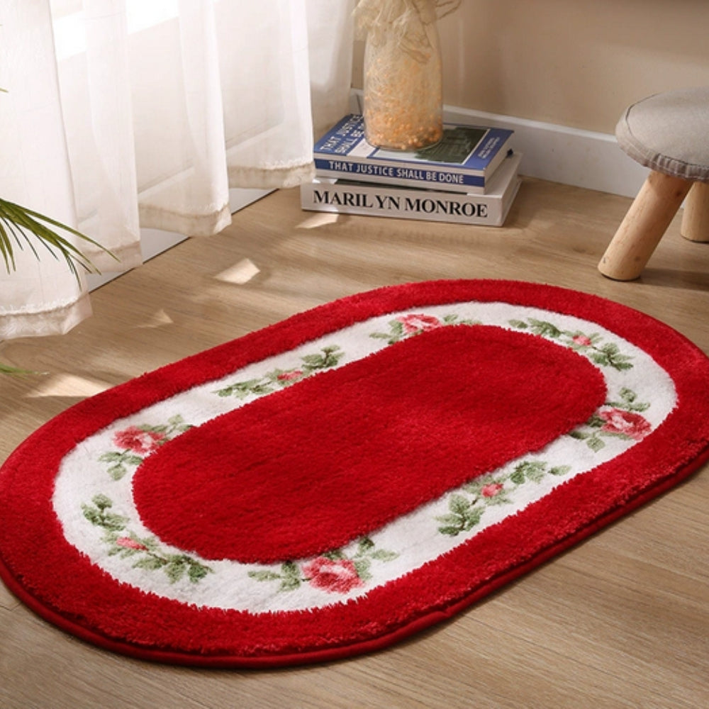 Oval plysjbadematte med blomster