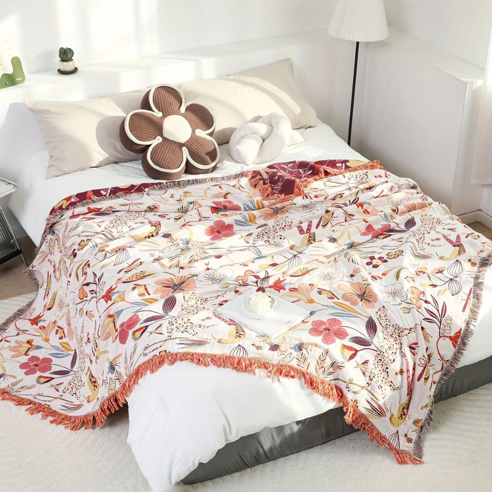 Jungle Bloom vendbart bomullspledd