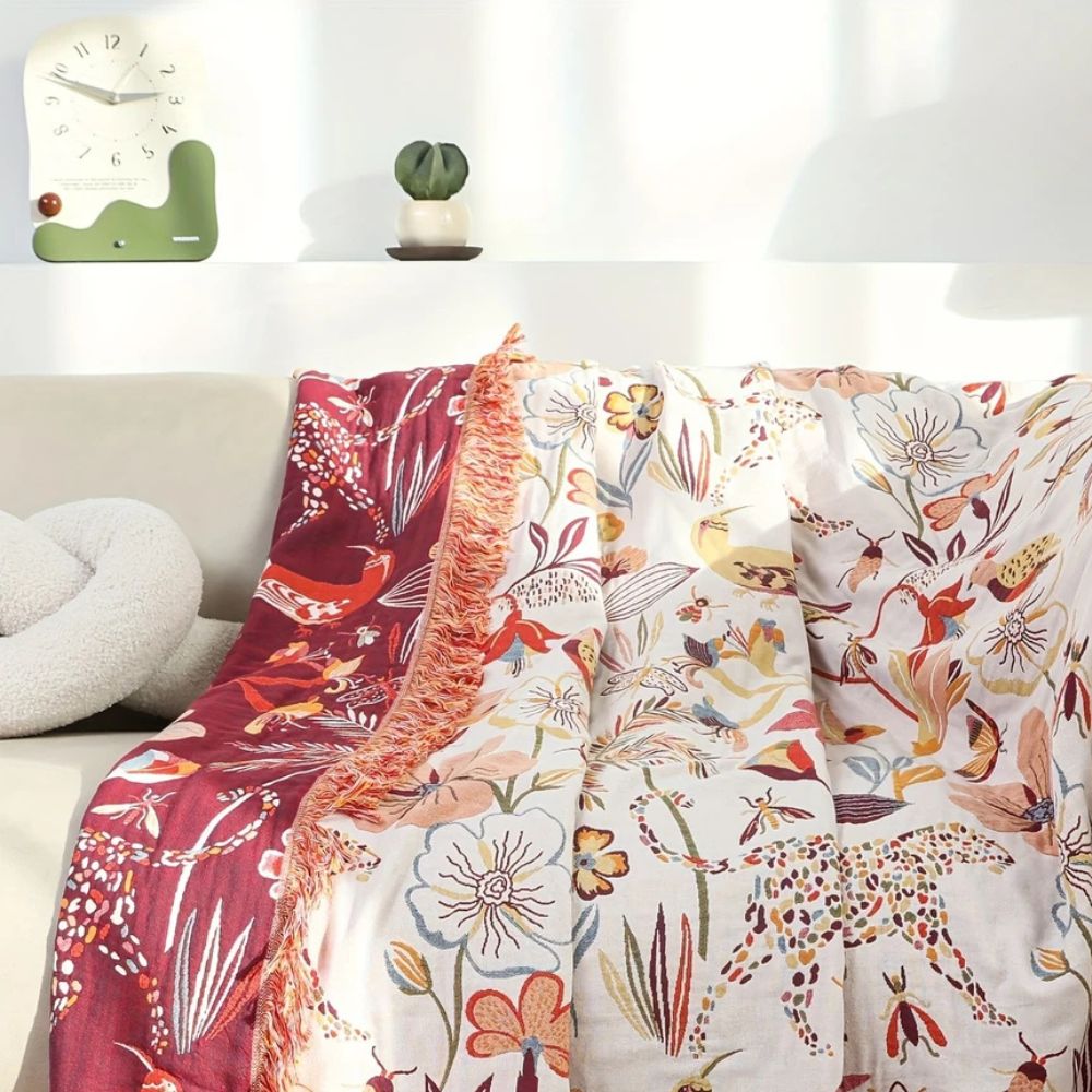 Jungle Bloom vendbart bomullspledd