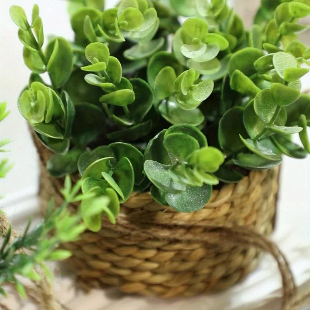 Leafara hengende kunstig plante i vevd kurv