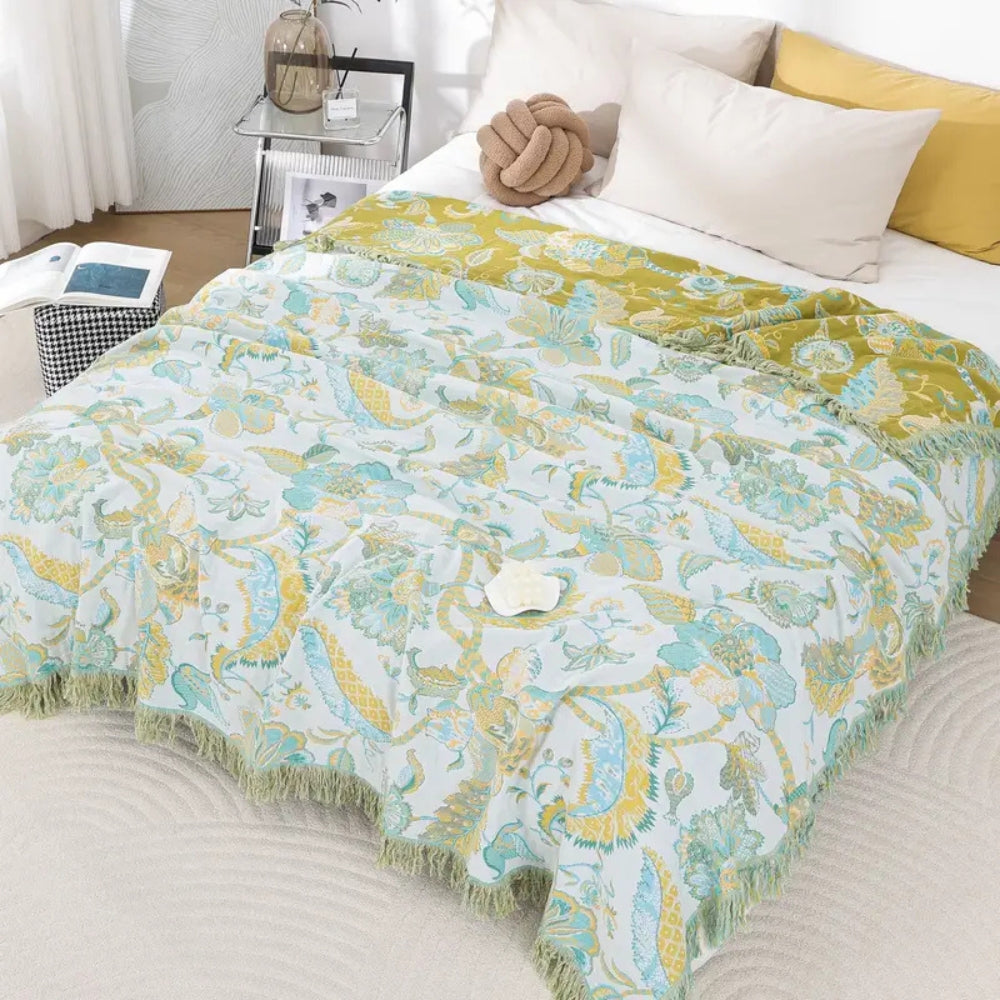 Reverie bomullspledd med blomster og dusker – Cinnamon Blossom
