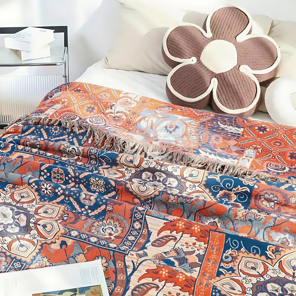 Solea bomullspledd i blomsterjacquard