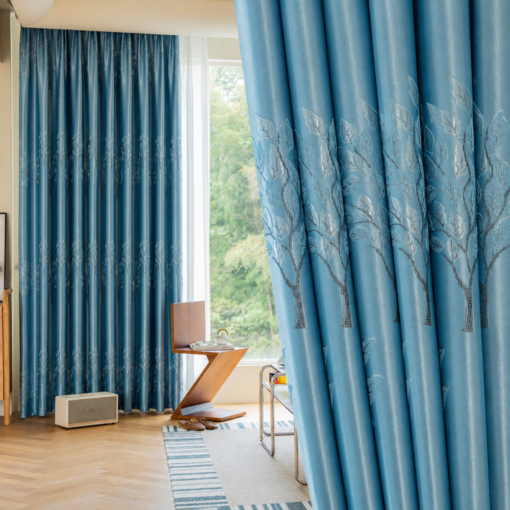 Elysian mørkleggingsgardiner med bladmotiv