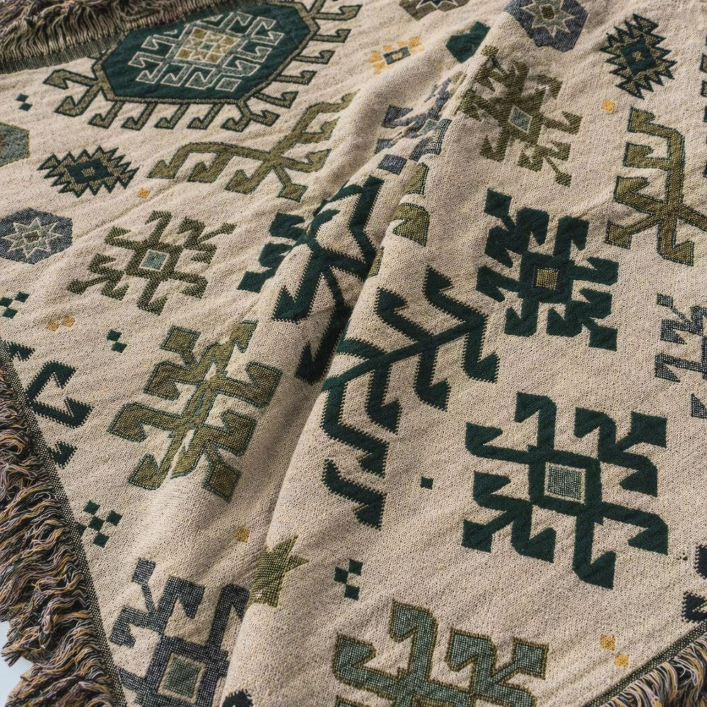 Tribal-inspirert mykt geometrisk bomullspledd med frynser
