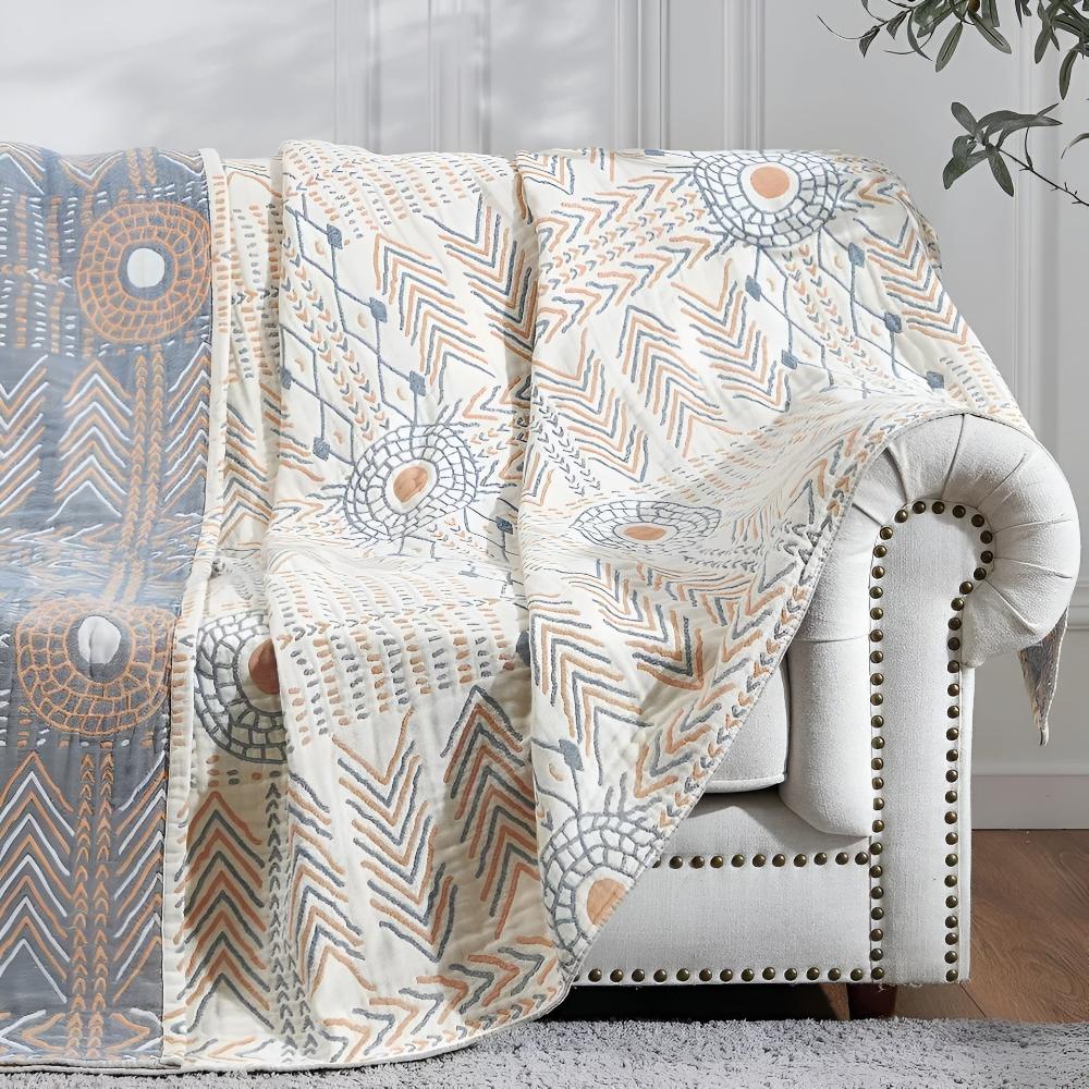 Vendbart elegant bomullspledd