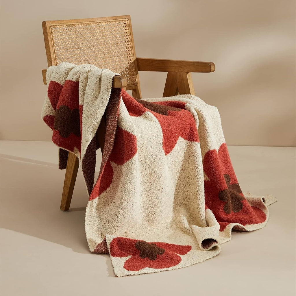 Aurora Bloom | Strikket pledd med blomster